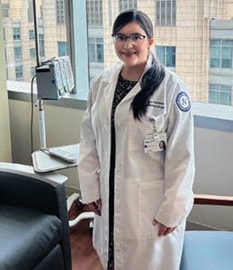 Gina Perez Giraldo, MD, in medical office