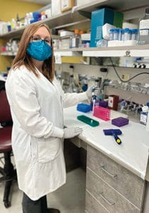 Monica Langley, PhD, in lab